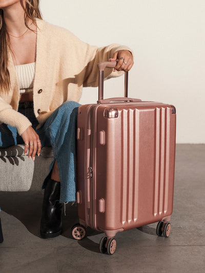 Lightweight rose gold CALPAK Ambeur 22-inch rolling spinner carry-on luggage; LAM1020-ROSE-GOLD view 2