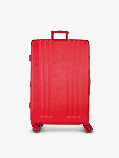 Studio product shot of front-facing CALPAK Ambeur large 30-inch hardshell luggage with 360 spinner wheels in metallic red; LAM1028-METALLIC-RED view 1