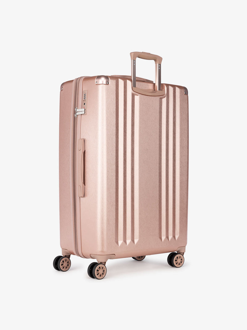 large 30 inch rose gold lightweight hardsided suitcase