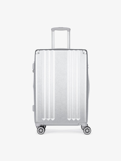 Studio product shot of front-facing CALPAK Ambeur silver medium 26-inch lightweight hardshell rolling luggage; LAM1024-SILVER view 1