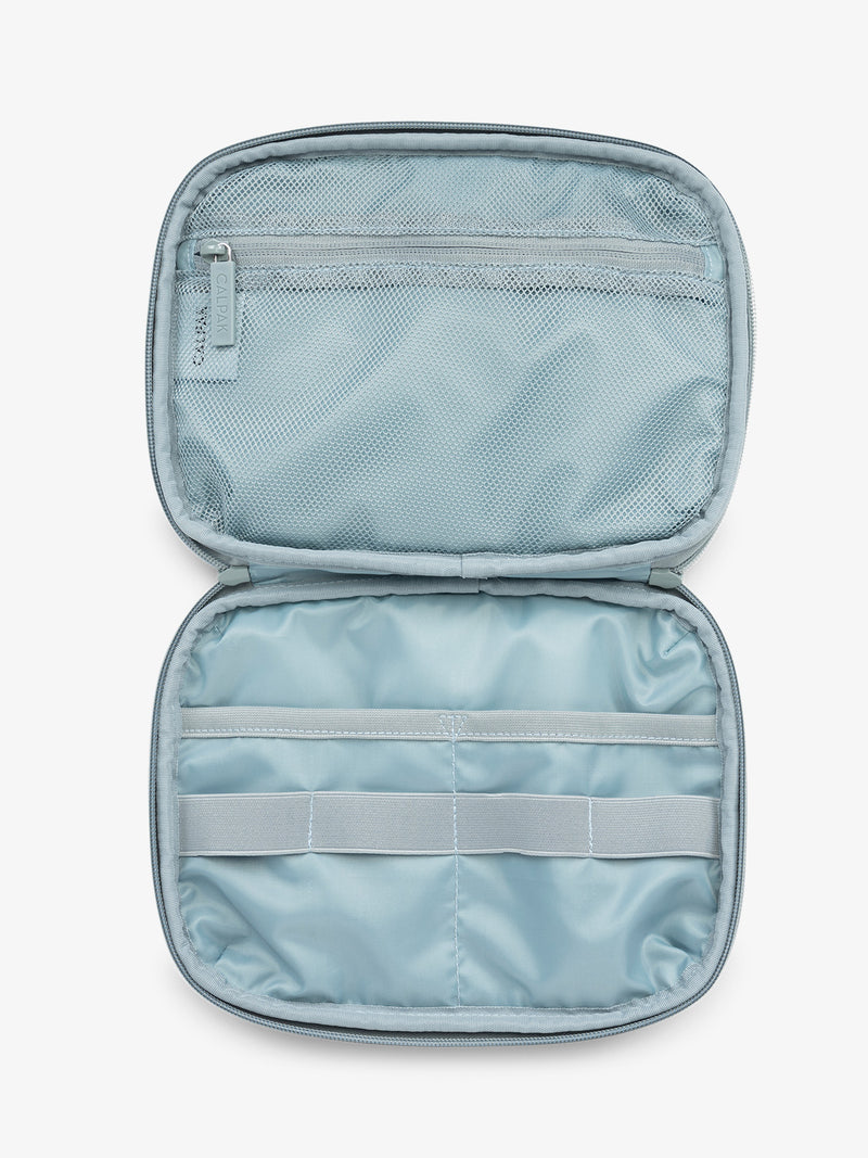 CALPAK Tech Organizer in blue Bluebell open view with tech mesh pockets