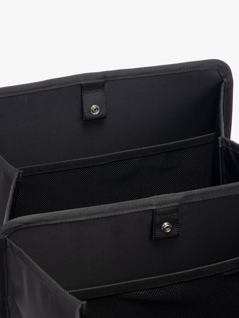 interior of black CALPAK car organizer for trunk