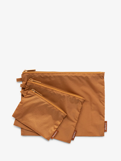 CALPAK Compakt zippered pouches in brown camel; KZB2001-CAMEL view 1