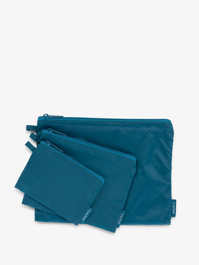 CALPAK Compakt zippered pouches in lagoon; KZB2001-LAGOON view 1