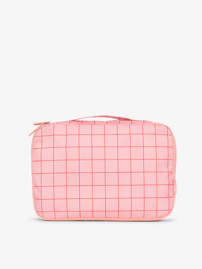 CALPAK packing cubes with top handle in pink grid print