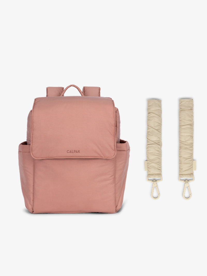 CALPAK Convertible Mini Diaper Backpack in pink Peony with white Oatmeal Stroller Straps