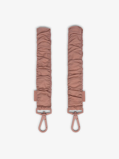 CALPAK Stroller Straps for Diaper Bag made with Oeko-Tex certified, recycled, and water-resistant materials in peony pink