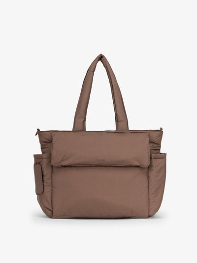 CALPAK Diaper Tote Bag with Laptop Sleeve made with durable, recycled, water-resistant material and a magnetic front pocket closure in hazelnut; TBB2401-HAZELNUT view 1