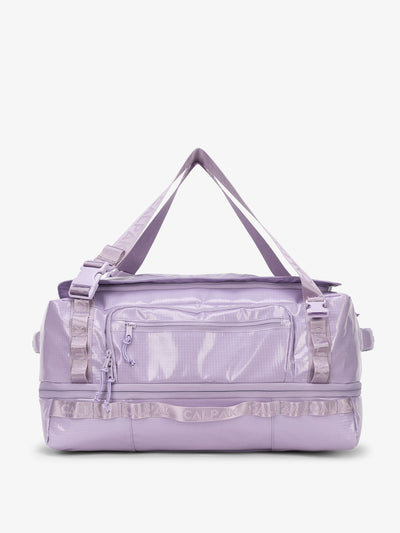 Duffle view of the Terra 50L CALPAK Light purple terra large 50L duffel backpack with removable and adjustable body shoulder strap; DTL2301-AMETHYST view 1