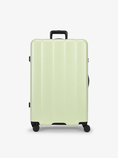 CALPAK daisy large luggage made from an ultra-durable polycarbonate shell and expandable by up to 2"