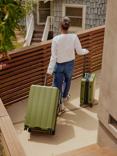 CALPAK Pistachio green large luggage made from an ultra-durable polycarbonate shell and expandable by up to 2; LCO1028-PISTACHIO view 2