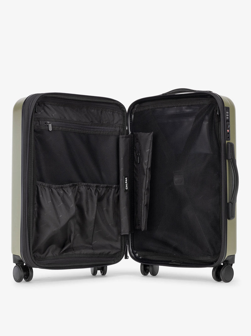 CALPAK Evry Medium Luggage features divided compartments with interior pockets for organized packing in pistachio green