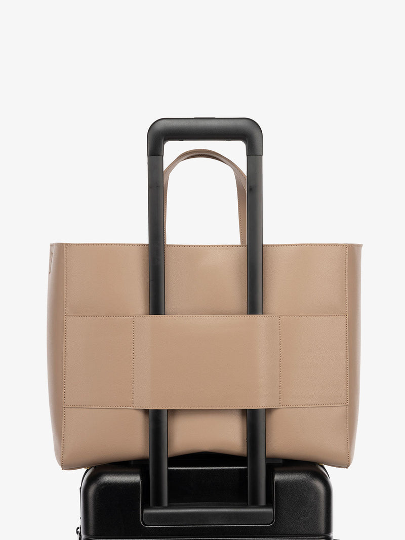 CALPAK Haven tote bag with laptop compartment and trolley sleeve in taupe