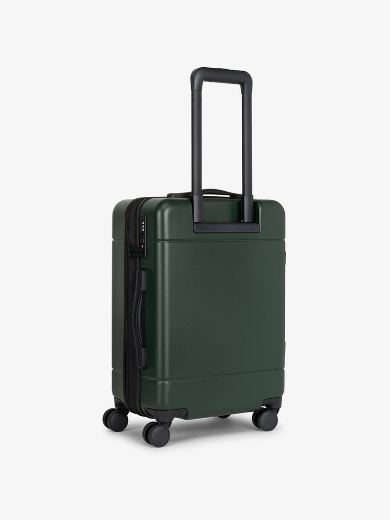 CALPAK Hue Carry-On Luggage back view in hard shell in green emerald