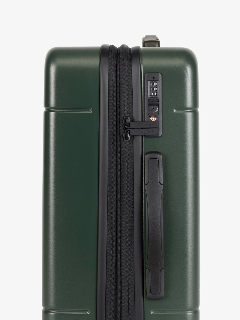 CALPAK Hue Large 30 inch hard shell Luggage side view of TSA-friendly lock in green Emerald