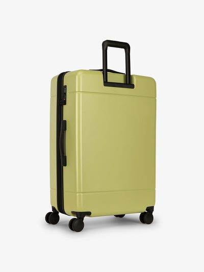 CALPAK Hue large 28 inch durable hard shell polycarbonate luggage in green