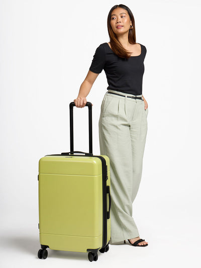 CALPAK Hue medium 26 inch hardside luggage in key lime; LHU1024-KEY-LIME
