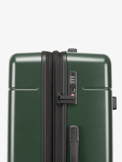 Dark green CALPAK medium trunk luggage with TSA accepted lock