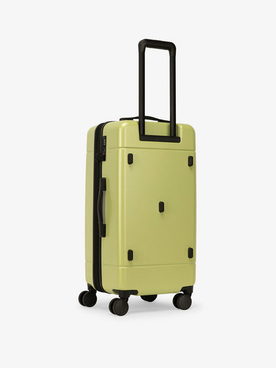 CALPAK hue medium trunk luggage with 360 spinner wheels and TSA approved lock in light green