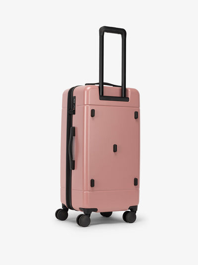 CALPAK hue medium trunk luggage with 360 spinner wheels and TSA approved lock in pink