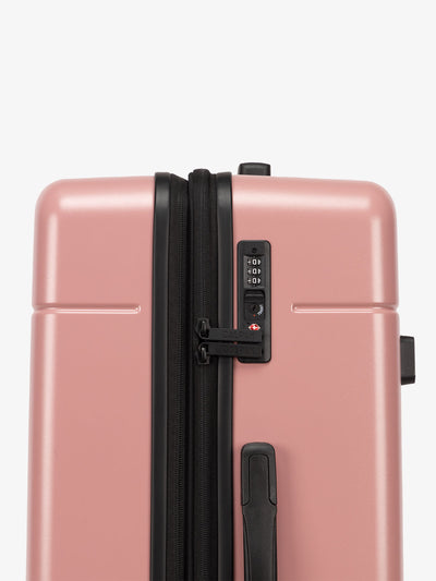 Mauve pink CALPAK medium trunk luggage with TSA accepted lock