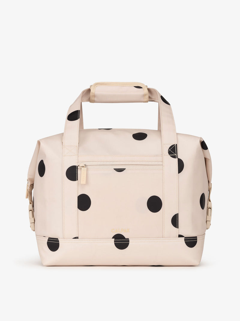 Black and white polka dot printed 17L insulated cooler bag with multiple exterior pockets and water-resistant lining