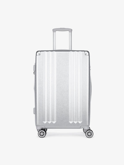 Studio product shot of front-facing CALPAK Ambeur silver medium 26-inch lightweight hardshell rolling luggage; LAM1024-SILVER