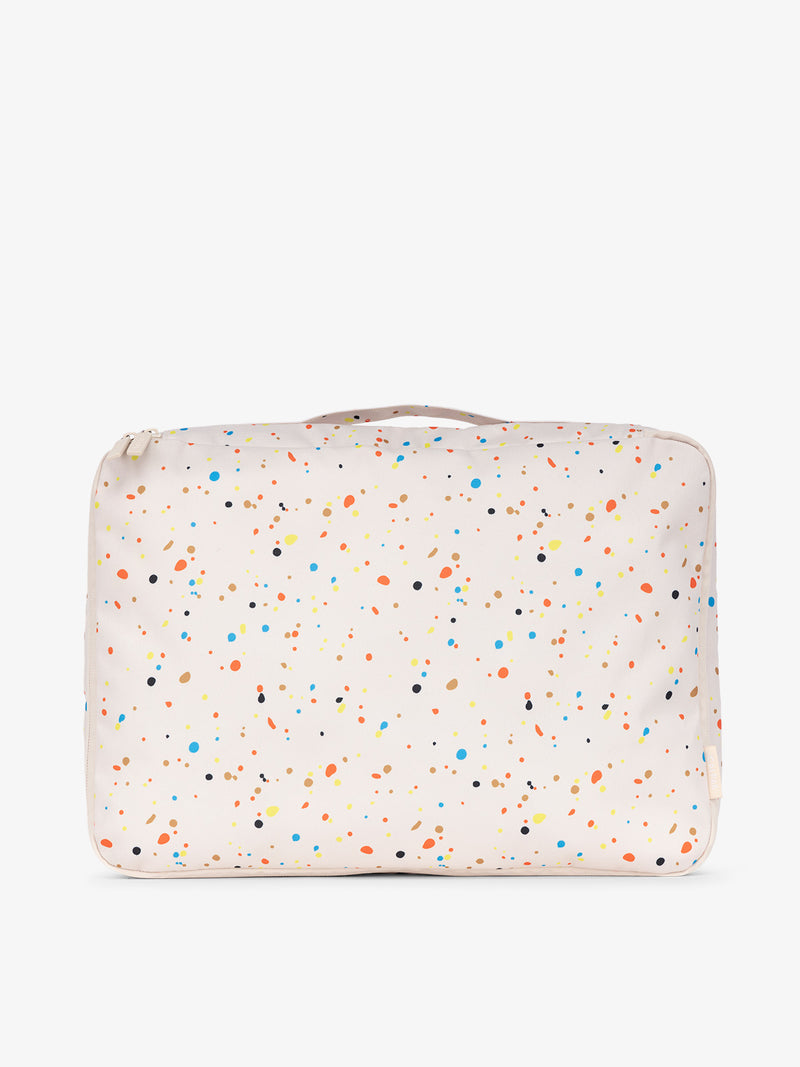 CALPAK large packing cubes with top handle in off-white and multicolored speckle