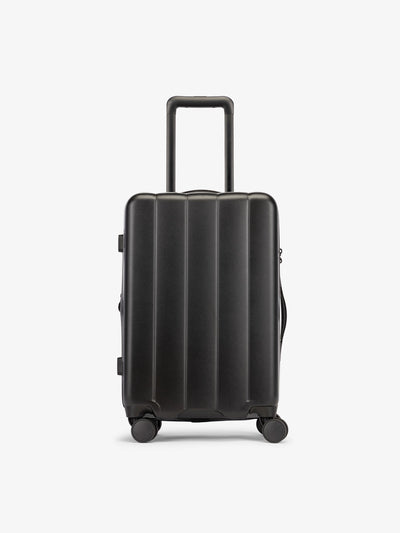 CALPAKs Black carry-on luggage made from an ultra-durable polycarbonate shell and expandable by up to 2