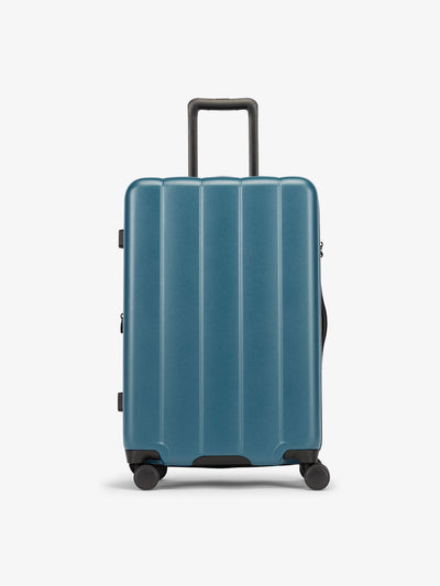 CALPAK Pacific blue medium luggage made from an ultra-durable polycarbonate shell and expandable by up to 2