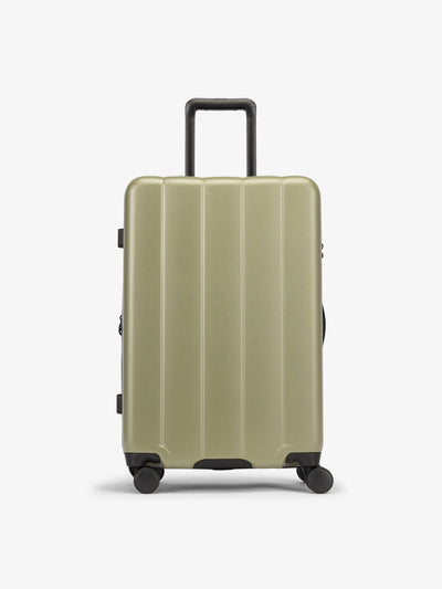 CALPAK Green pistachio medium luggage made from an ultra-durable polycarbonate shell and expandable by up to 2; LCO1024-PISTACHIO view 1