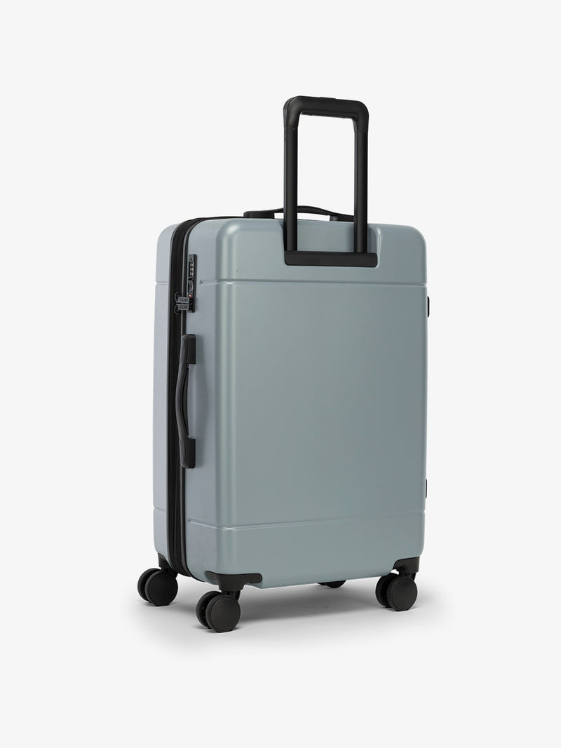 CALPAK Hue Medium Luggage in blue Bluebell back view