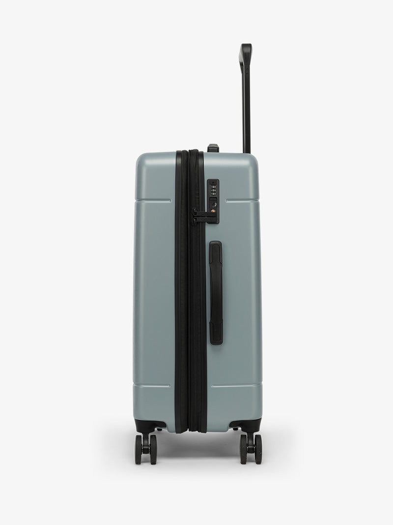 CALPAK Hue Medium Luggage in blue Bluebell side TSA-friendly lock