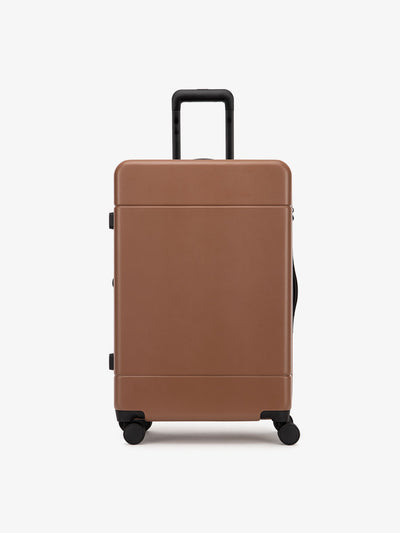 medium 26 inch hardside polycarbonate luggage in brown hazel color from CALPAK Hue collection; LHU1024-HAZEL
