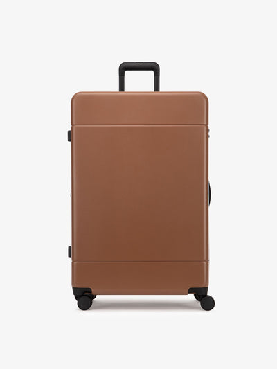 large 30 inch durable hard shell polycarbonate luggage in brown hazel color from CALPAK Hue collection; LHU1028-HAZEL