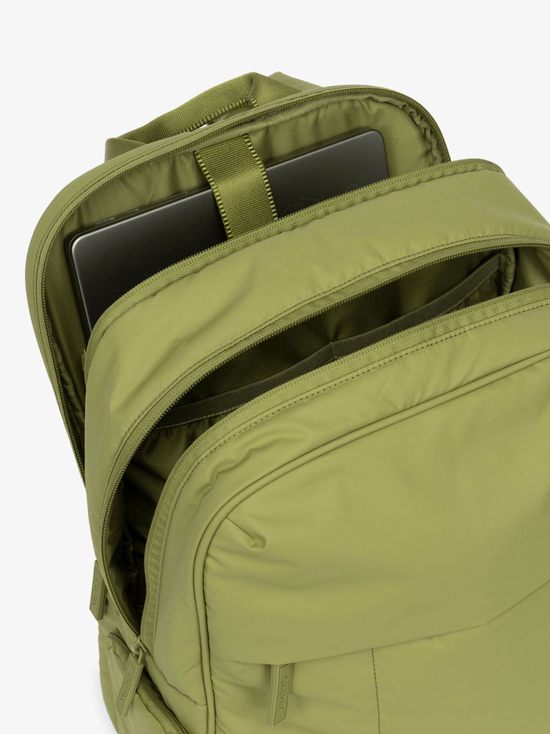 CALPAK Luka 15 Inch Laptop Backpack with soft puffy exterior and multiple pockets in green