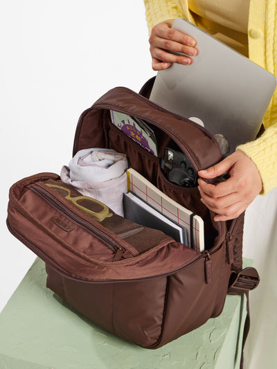 CALPAK Luka laptop backpack in cream oatmeal; BPL2001-OATMEAL