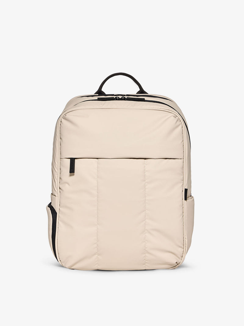 CALPAK Luka 17 inch Laptop Backpack featuring soft, puffy exterior and water resistant lining in oatmeal