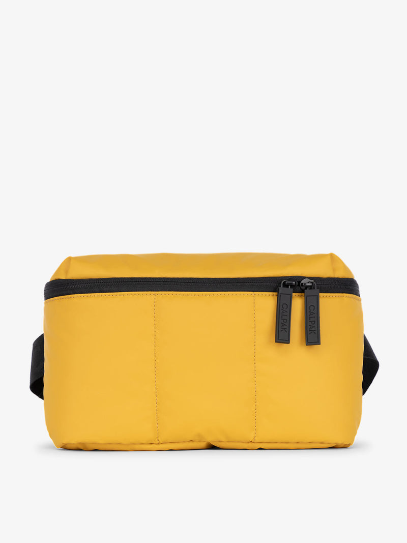 CALPAK Luka belt bag in yellow dijon color