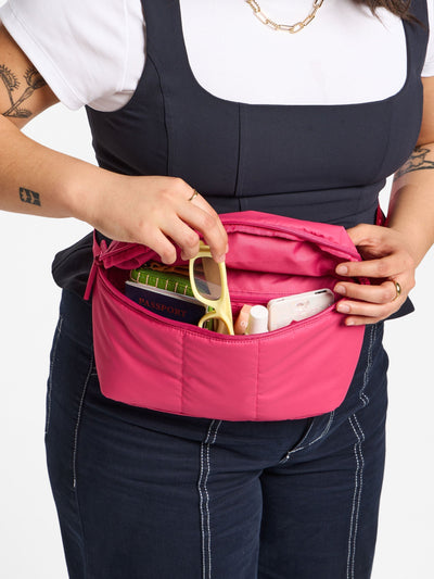 CALPAK Luka Belt Bag with soft puffy exterior in pink dragonfruit; BB1901-DRAGONFRUIT view 2