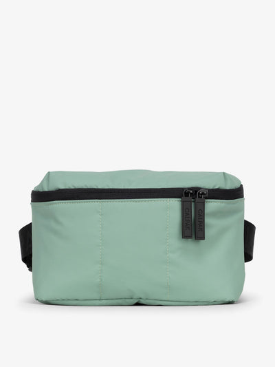 CALPAK Luka Belt Bag with soft puffy exterior in green; BB1901-SAGE view 1