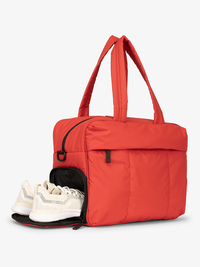 shoe compartment for CALPAK Luka Duffel Bag in red