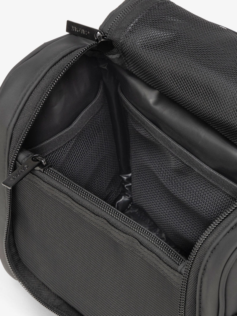 CALPAK Luka Hanging Toiletry Bag with water-resistant lining and mesh pockets for toiletries and makeup in matte black