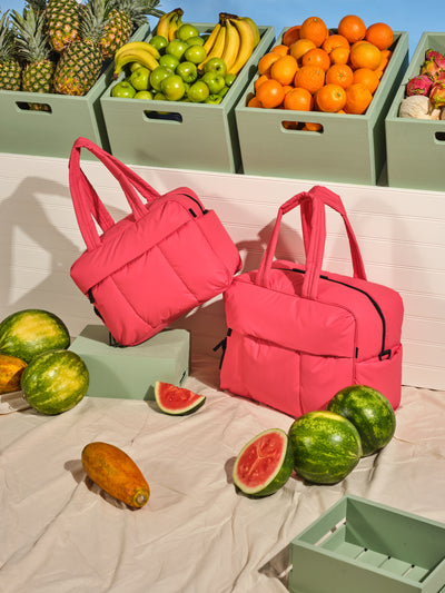 CALPAK Luka large duffle bag with detachable strap and zippered front pocket in watermelon; DLL2201-WATERMELON