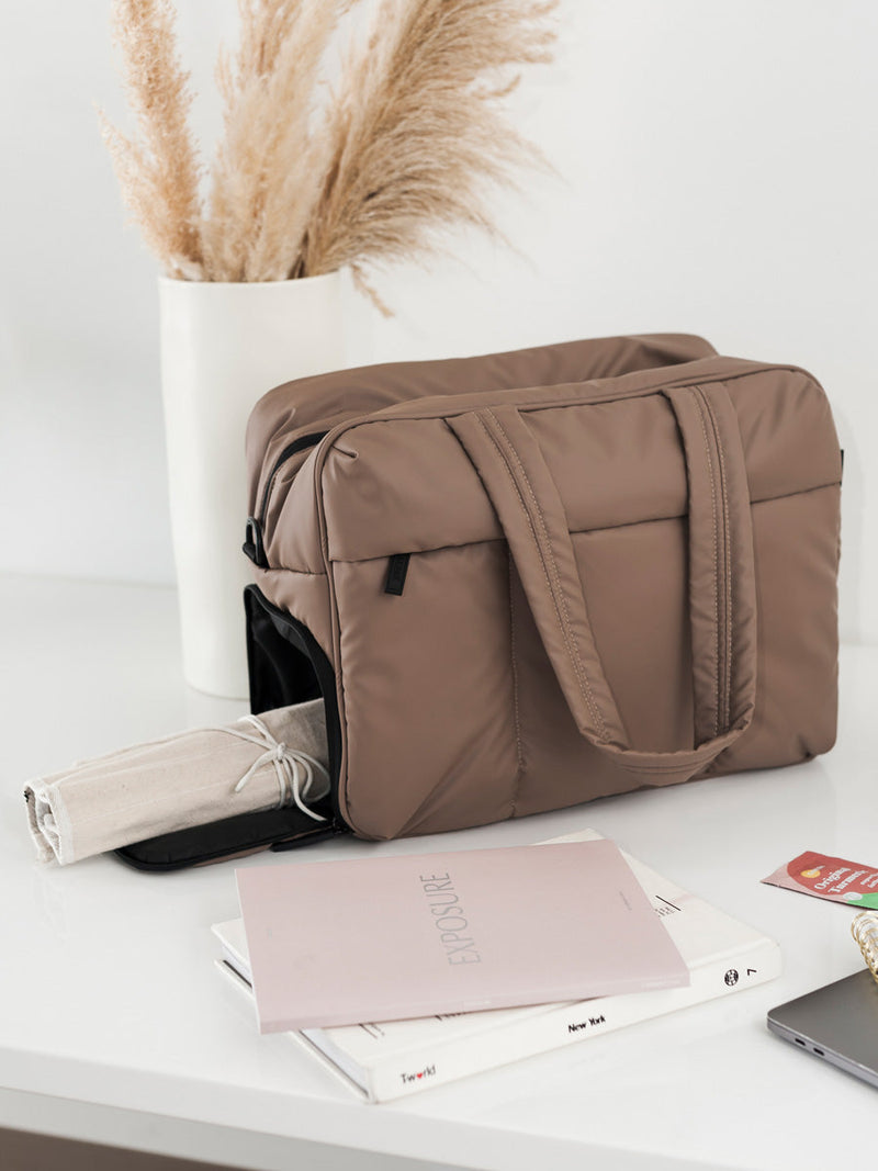 brown CALPAK Luka duffle bag