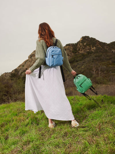 CALPAK Luka Mini Backpack for essentials for everyday use with puffy exterior and water resistant interior lining in light blue; BPM2201-WINTER-SKY view 2