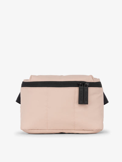 CALPAK Luka Mini Belt Bag with soft water-resistant exterior in pink; BBM2201-ROSE-QUARTZ view 1