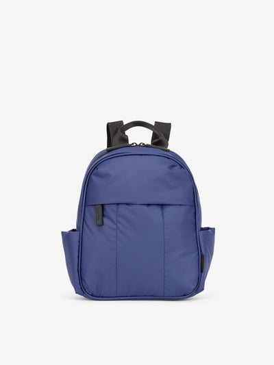 CALPAK Luka Mini Backpack with soft puffy exterior and front zippered pocket in navy blue; BPM2201-NAVY
