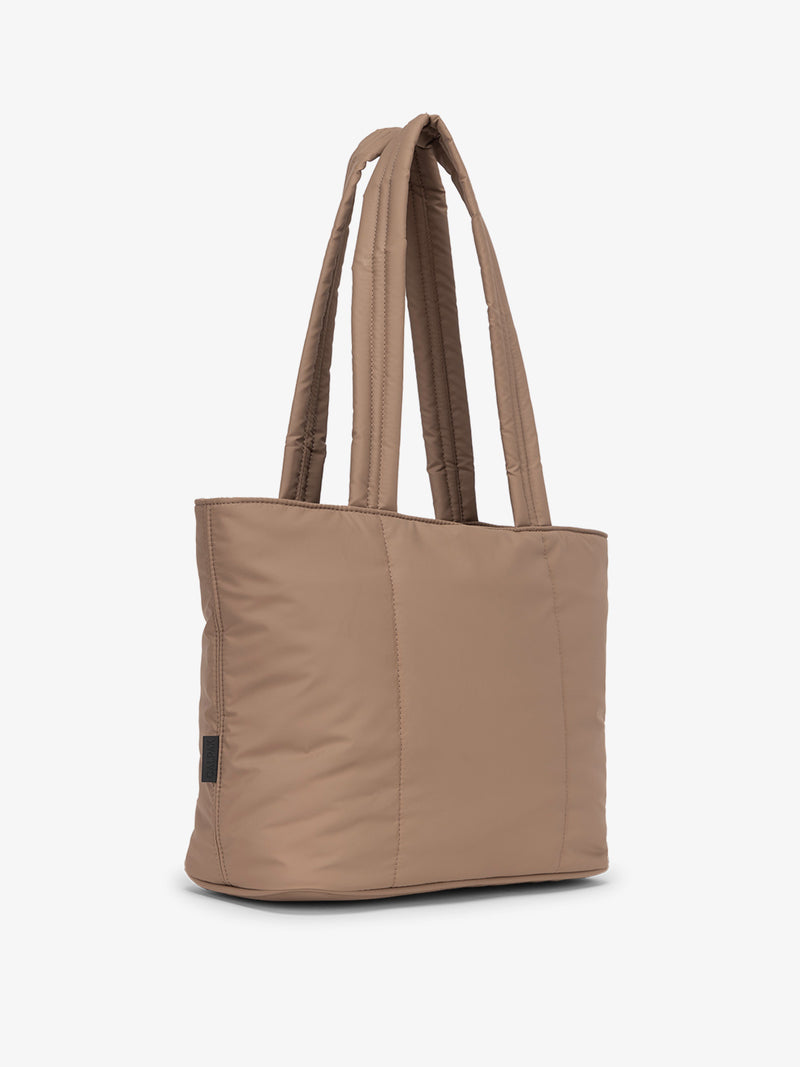 Brown CALPAK Luka Mini Tote with durable padded shoulder straps