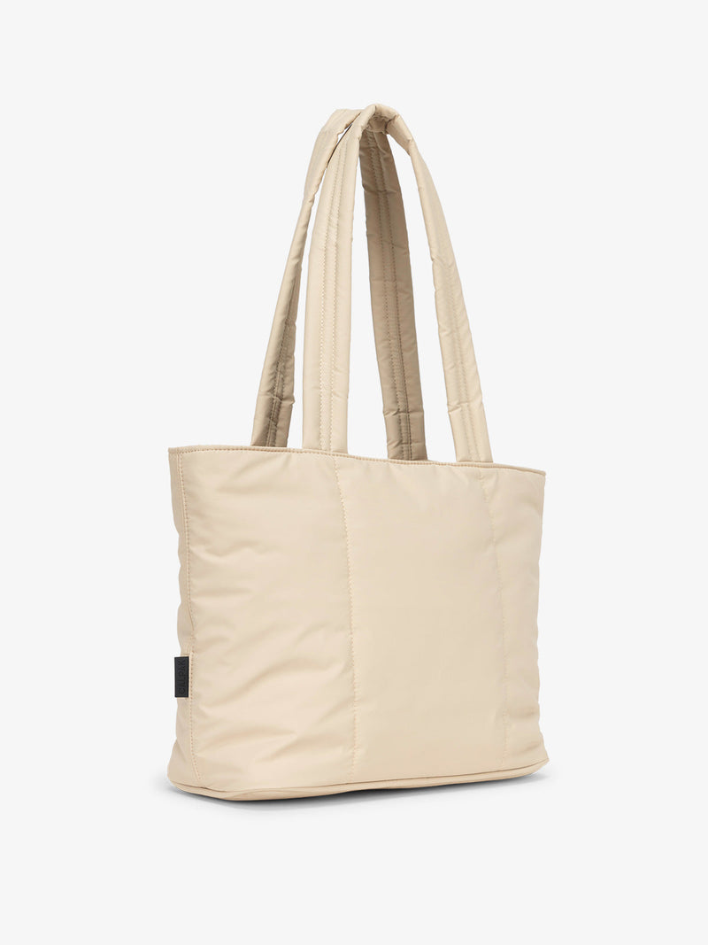 Beige CALPAK Luka Mini Tote with durable padded shoulder straps